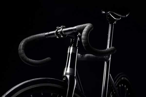 black racing bike on black background