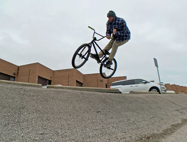 Mike on BMX mid air