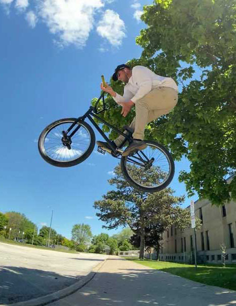 Mike on BMX handlebar spin in the air